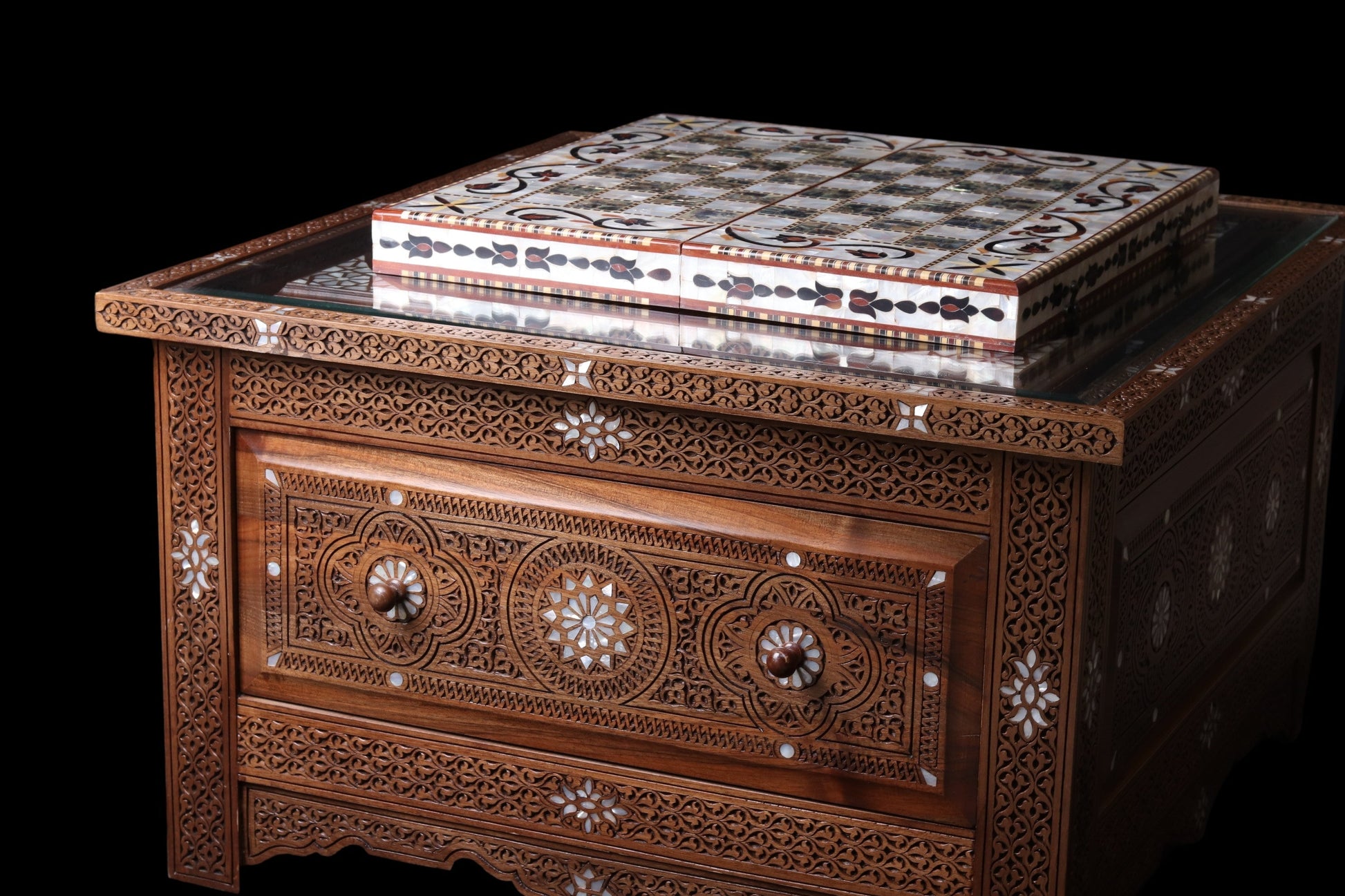 Hand Carved Table - Inlayed with mother of pearl.